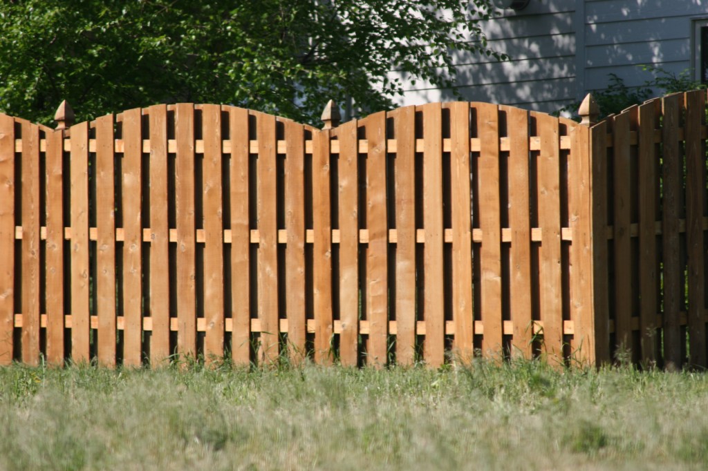 Kearney residential fence company Nebraska fence contractors wood fencing cedar western red cedar treated pine white red yellow CCA  ACQ2 incense fir 2x4 1x6 2" x 4"  1" x 6"  nails stain solid privacy picket scalloped board on board shadow box pickets rails posts installation panels post caps modern horizontal backyard front yard ranch gate garden diy split rail house lattice old rustic vertical metal post picket dog ear contemporary custom